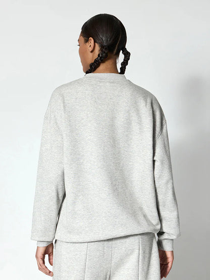 Sweat-shirt gris en molleton doux et confortable